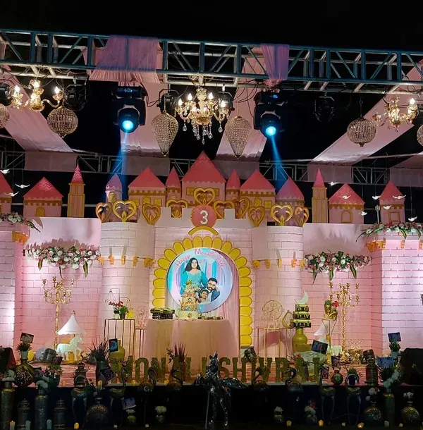 We can build a fairytale castle for your little royal's big day. This large-scale stage production features custom castle architecture, elegant lighting, and marquee numbers, perfect for a truly grand princess or prince themed birthday party.