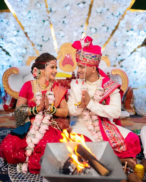 A beautiful moment during a Maharashtrian wedding ceremony, as the couple performs the Havan ritual together. I focus on capturing the sacred fire and the couple's expressions of devotion.