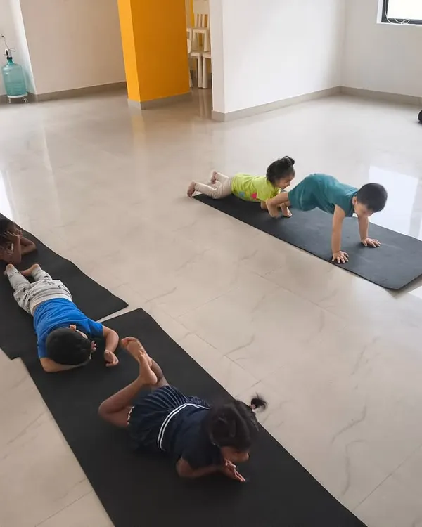 Building core strength and flexibility! Our indoor classes include gymnastics and fitness elements, like this plank exercise, to develop well-rounded athletes.