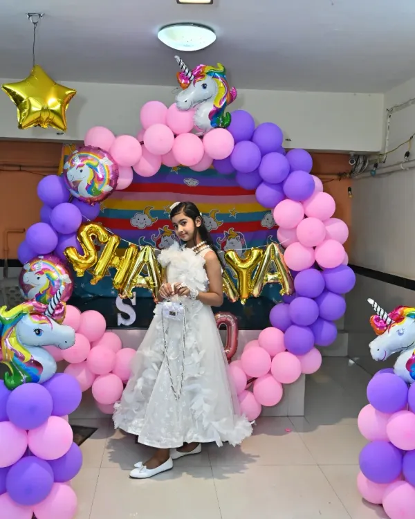 Seeing the birthday girl's face light up is why I do this. We created this magical Unicorn theme with a full balloon ring backdrop, custom unicorn pillars, and foil balloons to make her 10th birthday in Navi Mumbai unforgettable.