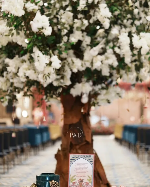 We created this 'Tree of Blessings' for a Bhajan Sandhya. It served as a central point for a beautiful ritual where guests tied sacred 'mouli' threads, whispering blessings for the couple.