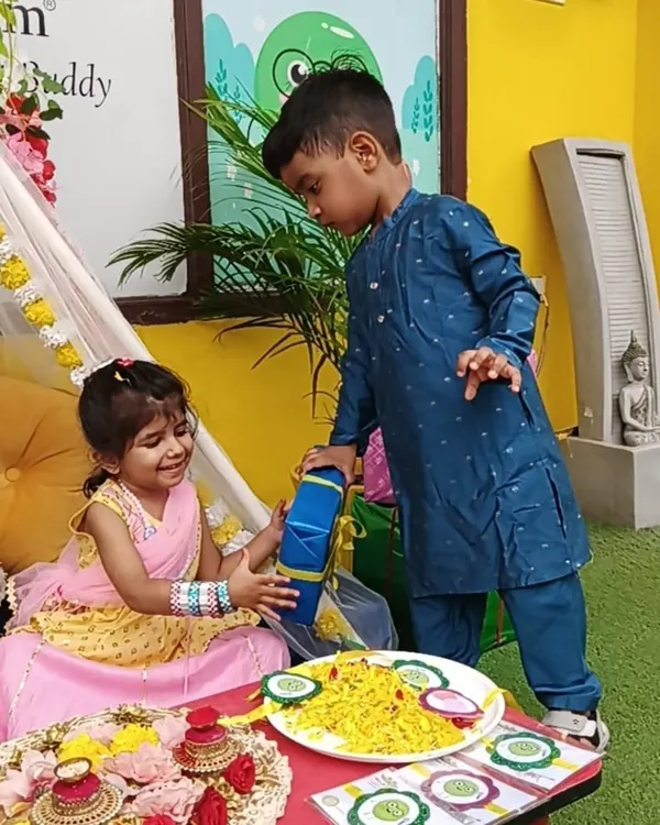 The pure bond of Rakshabandhan. A brother gives a gift to his sister, learning the values of love, care, and protection.