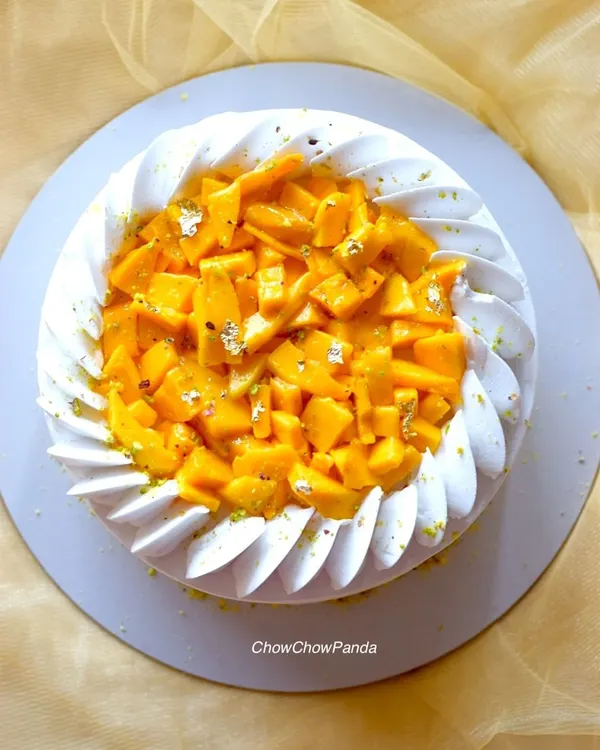 My signature mango cake, loaded with fresh, sweet mango pieces. It's a seasonal favourite that's always in demand.