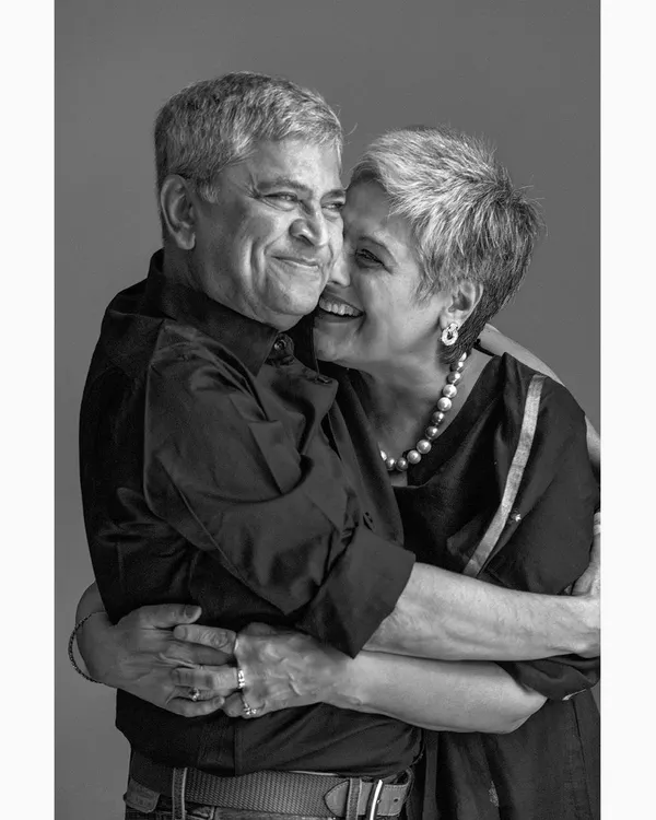 A tender moment captured during a couple's portrait session. These images focus on the quiet, intimate interactions that showcase a lifetime of love and companionship.