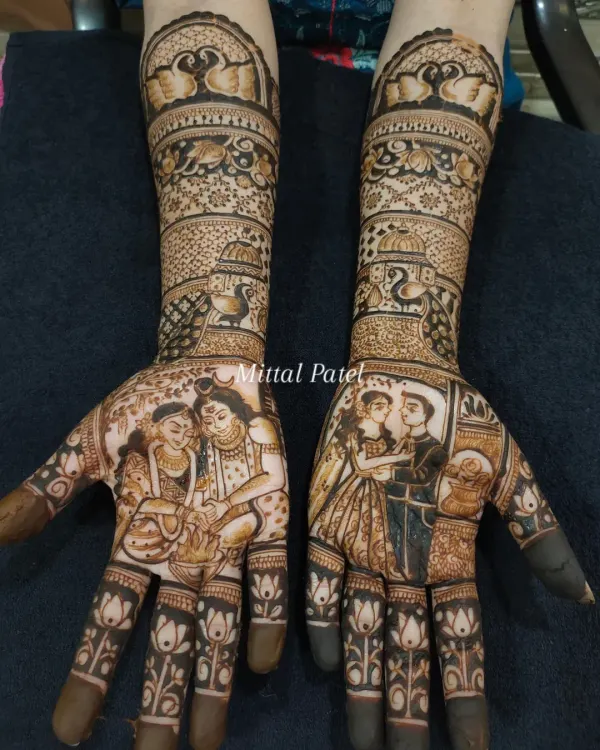 This full-arm bridal design is my specialty, combining a divine portrait of Shiv-Parvati with a personal portrait of the couple. It’s a perfect example of how I blend sacred blessings with your unique love story, creating a piece that is both spiritual and deeply personal.