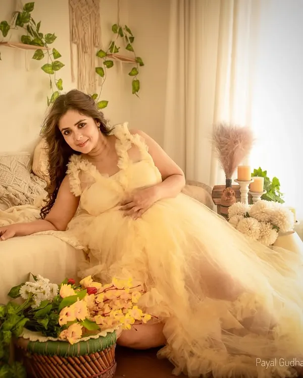 Bathed in soft, warm light, this portrait captures the dreamy and elegant feel of my bohemian studio setup. The yellow tulle gown adds a touch of sunshine to the earthy, natural decor.