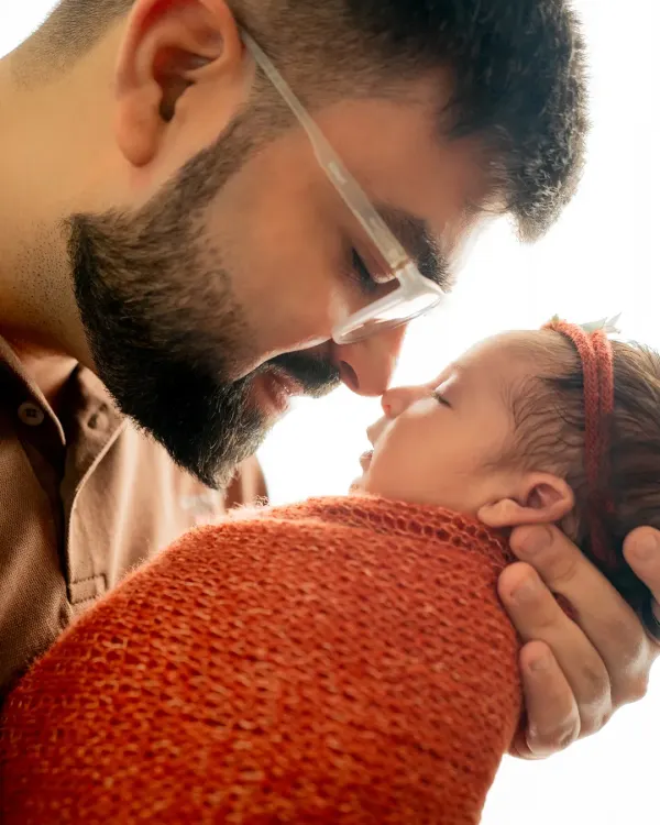 The journey doesn't end with the bump. This tender moment between a father and his newborn is what it's all about. I focus on capturing these first precious connections in a simple, heartfelt way.