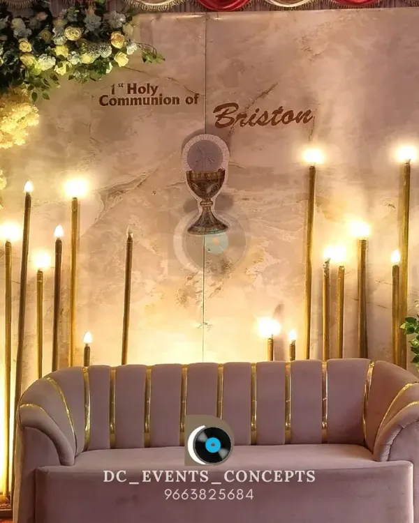 An elegant and serene stage for a First Holy Communion. The design features a soft color palette, candle-like floor lamps, and a chalice motif to honor the sanctity of the occasion.