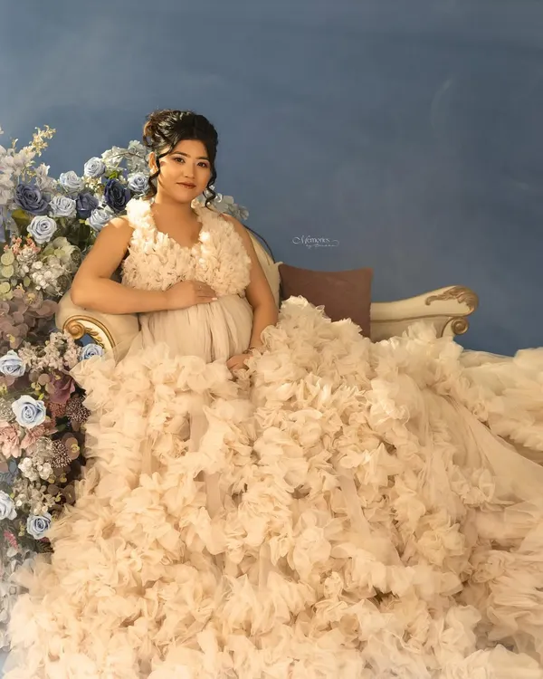 She dreamt of a fairytale moment, and we brought it to life. This couture maternity experience, with its soft florals and ethereal gown, was designed to reflect her grace and glow.