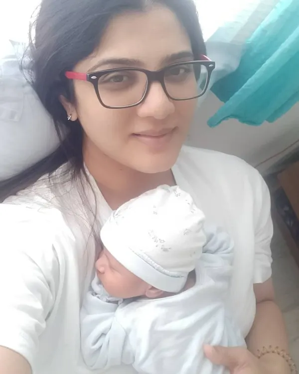 As a dermatologist and a new mom, I understand the skincare journey of pregnancy and postpartum firsthand. This is me with my son, a personal reminder of why I am so passionate about providing safe, effective, and empathetic care to other mothers.