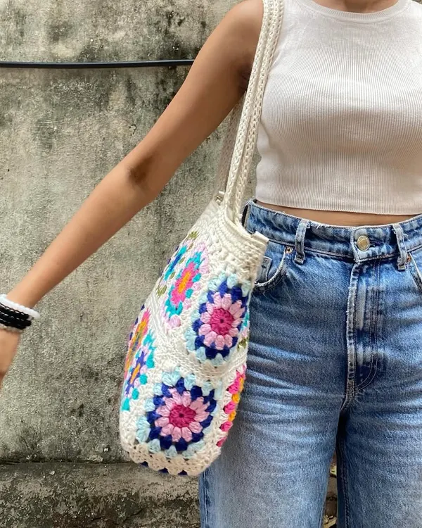 A side view of our spacious granny square tote, showing how it sits comfortably on the shoulder. It's lightweight yet durable, perfect for your everyday essentials.