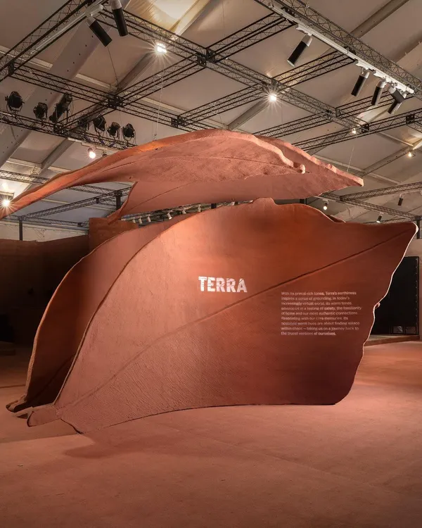 We believe art should feel like coming home. This installation, titled 'Terra', uses monumental, leaf-like forms to evoke the quiet and familiar feeling of walking on fallen leaves. The scale of the sculpture envelops the viewer, creating an emotional sanctuary that speaks to the cycle of nature, where everything returns to the primordial material of soil.