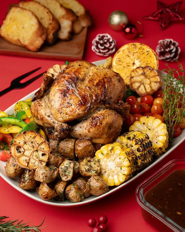 Our hero shot for a Christmas campaign: a magnificent roast chicken feast. This image was styled to capture the feeling of abundance and celebration that defines the holiday season.