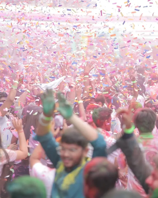 We know how to create an atmosphere of pure energy and celebration. This shot from a corporate Holi festival captures the peak of excitement, with a vibrant explosion of confetti over an engaged and happy crowd, demonstrating our skill in producing large-scale festive events.