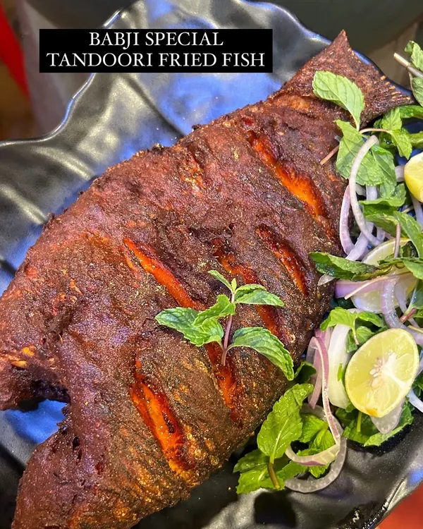 Our best-selling Tandoori Fried Fish, perfectly fried and served with fresh mint, onions, and a squeeze of lemon. The crispy skin and tender, flavorful meat make it a true highlight of our menu.