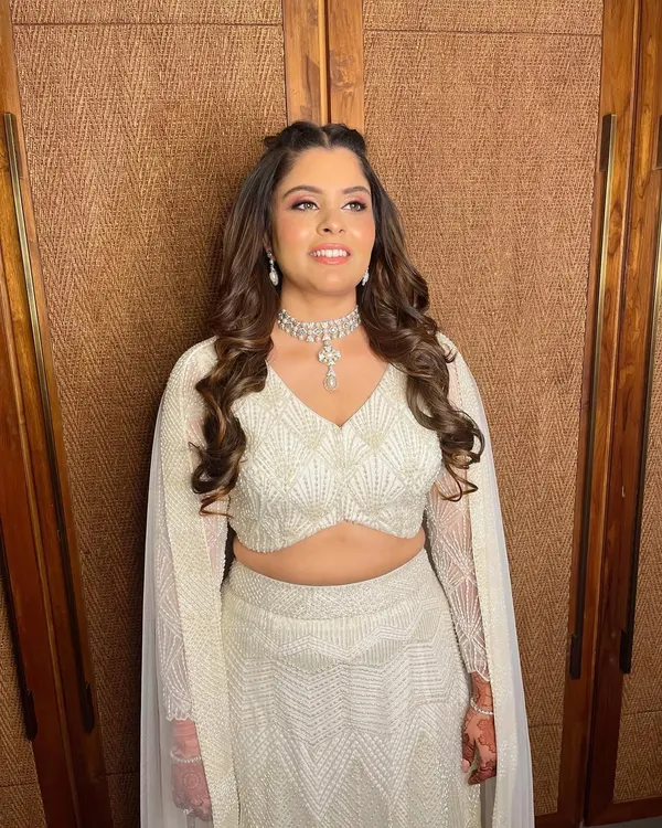 This is the 'Aadya Glow'. A look that focuses on luminous, healthy-looking skin, seen here on my bride Simran for her reception.