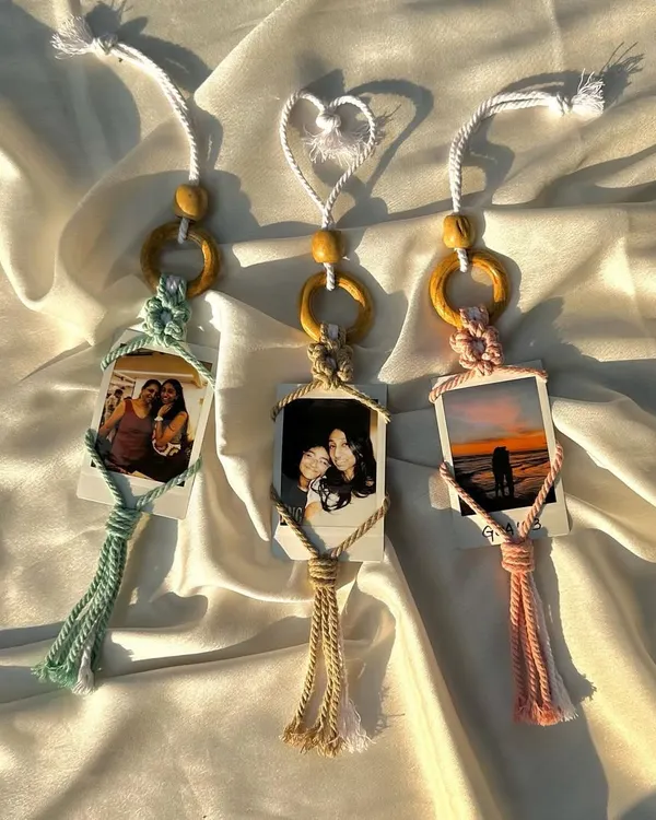 Our macrame polaroid holders are a beautiful way to display your cherished memories. We can customize the macrame color and even print your Instax photo to create a complete, ready-to-hang gift.