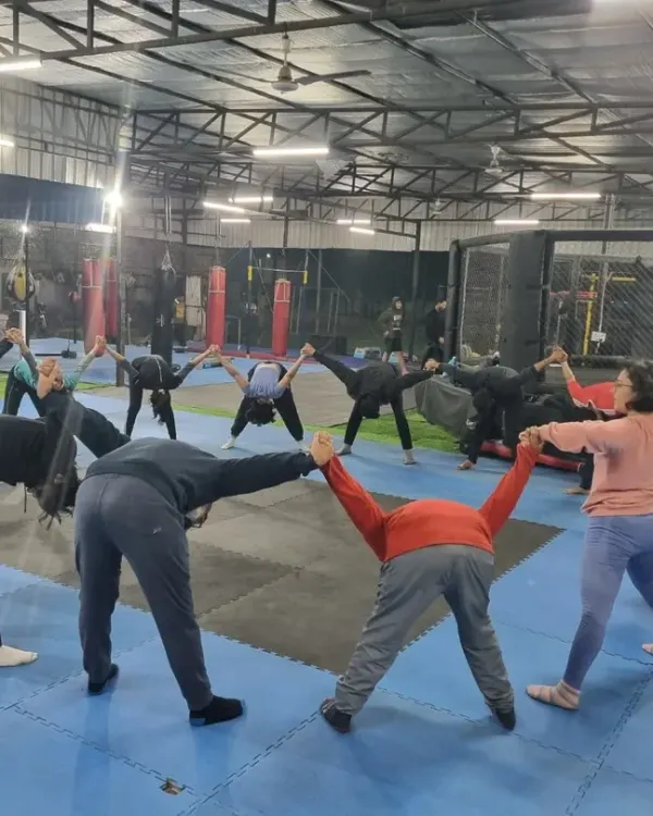 The workout isn't over until the cooldown is done. Our tribe stretches together, improving mobility and preventing injury as a team.