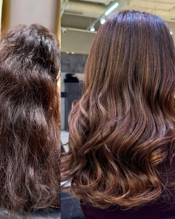This is the power of a proper color and treatment plan. We took this hair from frizzy and undefined to a rich, glossy chocolate brown with seamless balayage highlights. The health and shine are restored using a specific Redken Shades EQ formula of 30g of 6nch, 20g of 6RB, and 20g of 6N.