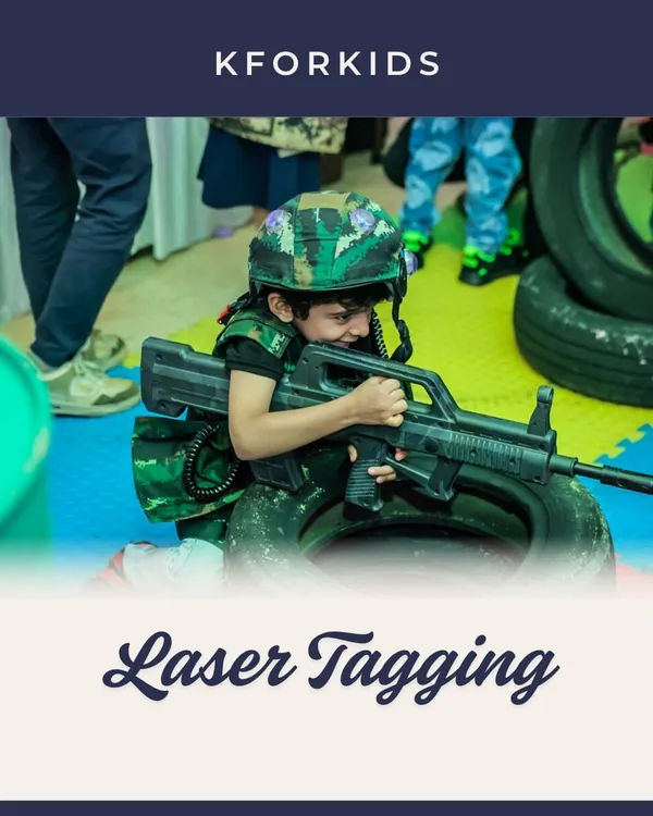 Get ready for battle! A young guest geared up for a game of laser tag, complete with a helmet and vest. I can set up a full laser tag arena for an adrenaline-pumping party experience.