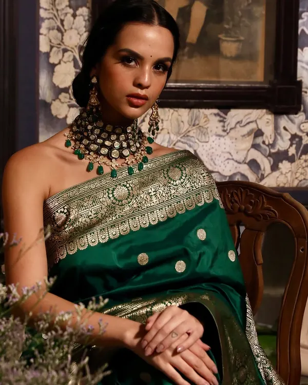 A stunning close-up from a shoot for Soho Begum, focusing on the intricate details of the hand-crafted Banarasi silk saree and jewellery. Our lighting setup is perfect for capturing the richness of luxury fabrics and accessories.