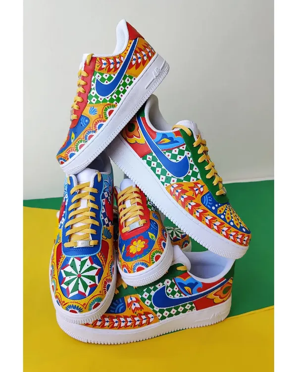 Here's a tower of my recent Truck Art inspired creations. I painted these Nike Air Force 1s for a client, each with different motifs but using a similar vibrant colour palette. It shows how you can have coordinated but unique pairs.
