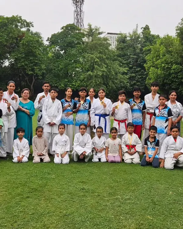 Our entire karate family, including students and their parents, after a successful event. The support of the family is our greatest strength.