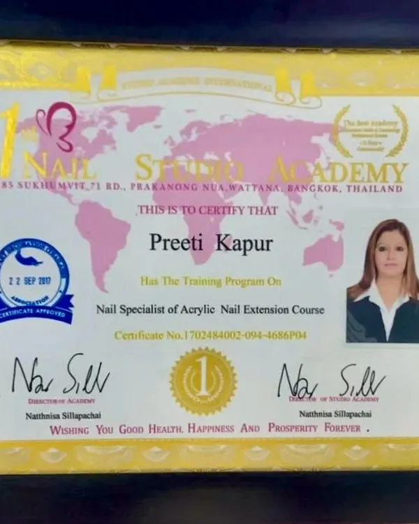 My official certification as a Nail Specialist in Acrylic Nail Extension from the prestigious Nail Studio Academy in Bangkok, Thailand.