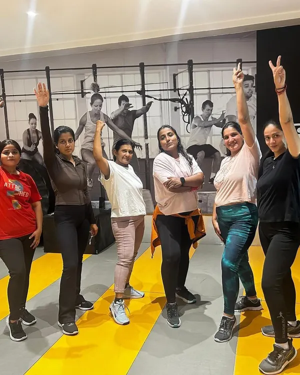 Our members posing together after a challenging and rewarding group workout. The smiles and sense of accomplishment are what our community is all about.