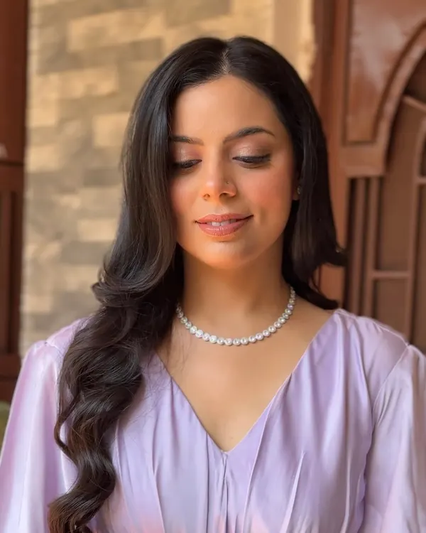 A close-up of my soft glam makeup in natural, shaded light. Notice how the skin still has a healthy sheen and the eye makeup is beautifully blended.