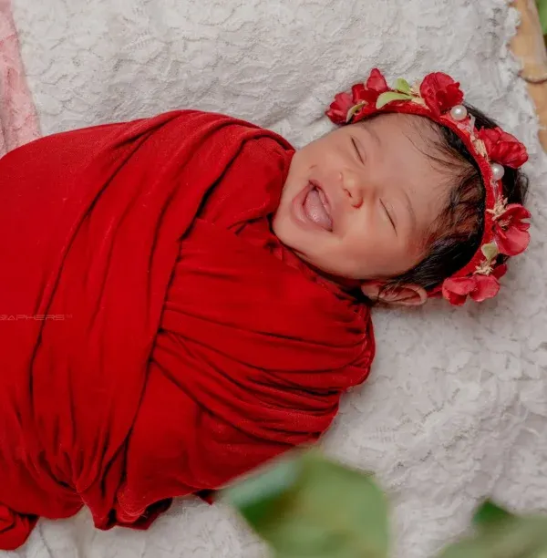 I believe every baby's smile is a tiny miracle. Capturing this moment of pure, unscripted joy is what I live for. This is the feeling I want you to hold onto forever.