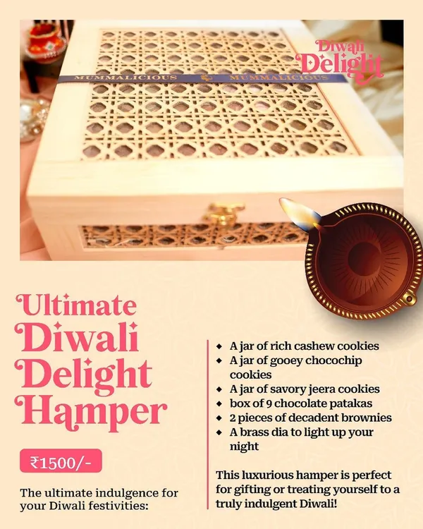 Our Ultimate Diwali Delight Hamper is perfect for indulgent gifting. It includes three kinds of cookies, decadent brownies, chocolate patakas, and a brass diya, all packed in a beautiful wooden box.