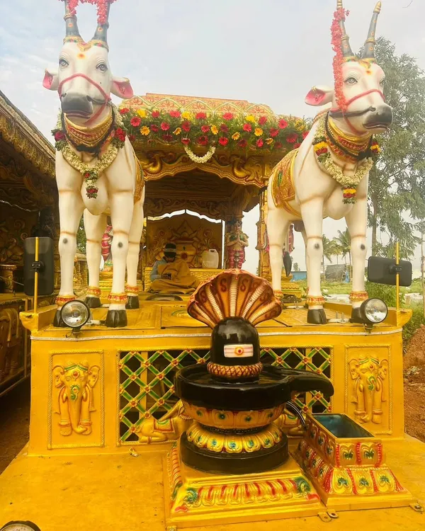 I specialize in decorating procession chariots (Ratha Gadi), creating elaborate mobile stages with deity statues, like this one featuring Lord Shiva and Nandi.