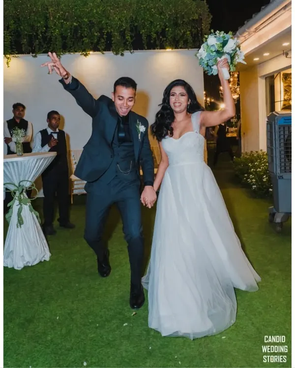 The grand entrance into the after-party! We capture the couple's high energy and excitement as they jump for joy, ready to celebrate with their loved ones.