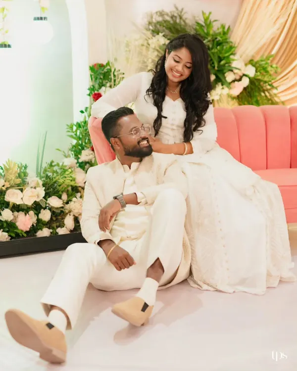 For Benoj and Mebin's engagement, we captured this sweet, candid moment. The simple, elegant decor with a pop of color from the pink sofa allowed their personalities and love for each other to be the main focus.