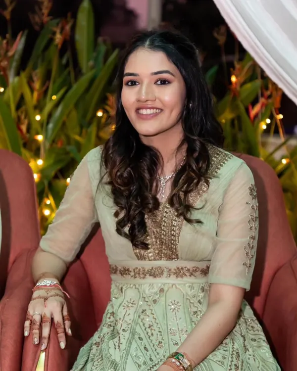 A simple yet elegant look for an engagement party. I created soft, natural-looking curls to complement her embroidered Anarkali, keeping the style effortless and chic.