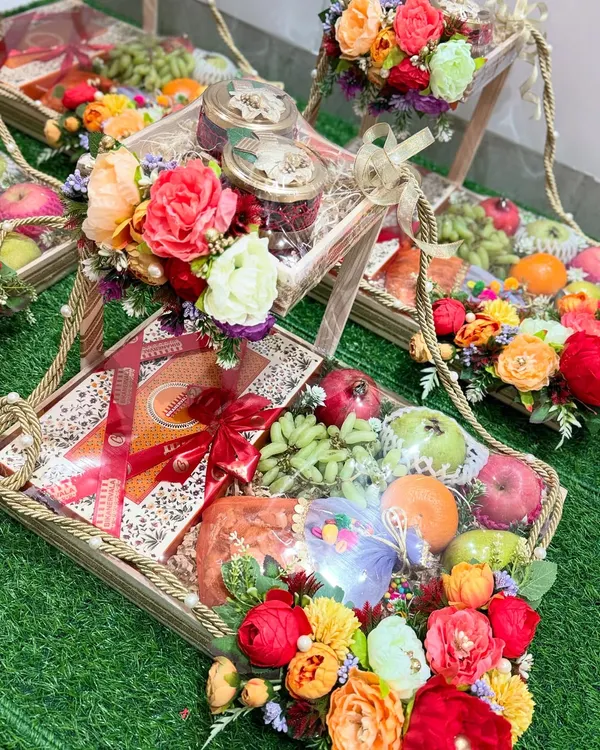 Wedding Da Shagan. This all-in-one tiered hamper is the perfect return favor, filled with fresh fruits, sweets, and dry fruits. It's a gift of health and happiness that your loved ones will cherish.