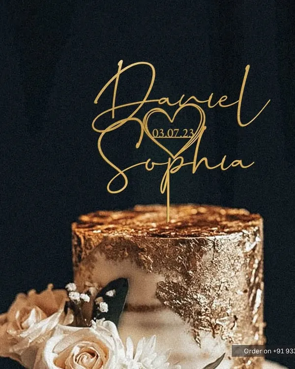 This stunning gold foil cake is perfectly complemented by our custom "Daniel & Sophia" topper. I can create elegant script designs like this for your wedding or anniversary, complete with your special date inside a heart motif.