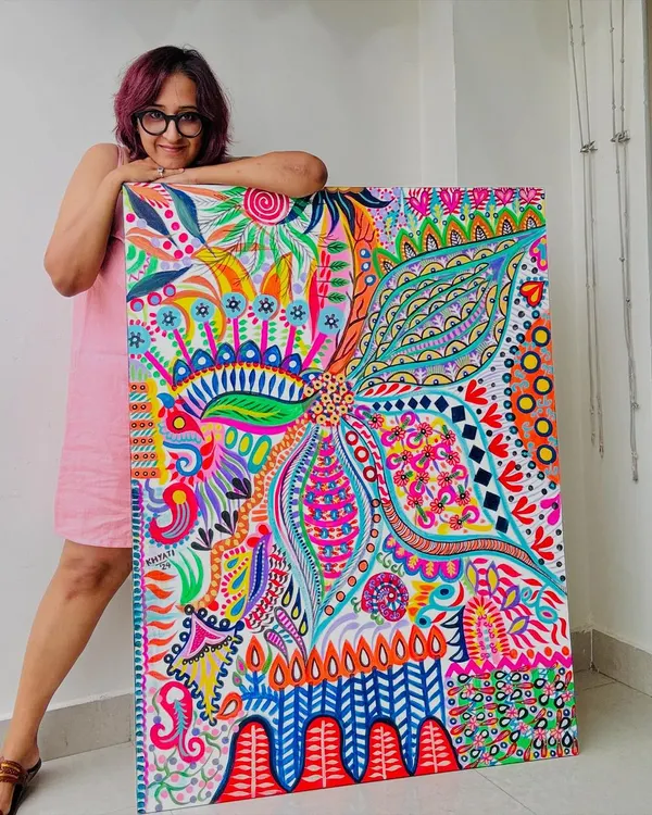 The artist and the art. This is me with my 3x4ft acrylic painting, 'Simplicity.' It's available for purchase and ready to bring its vibrant energy to a new home.
