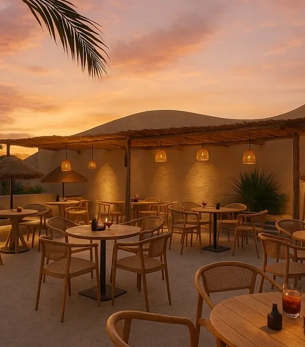 This is where the sky meets the earth. I designed this rooftop bar to capture the magic of a sunset, using natural textures and warm lighting to create a space that feels like a permanent golden hour.