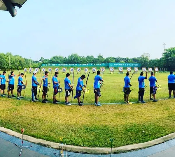 This is the kind of professional environment we prepare our archers for. A wide view of the shooting line at the KIIT International archery ground gives a sense of the scale of major university and national events.