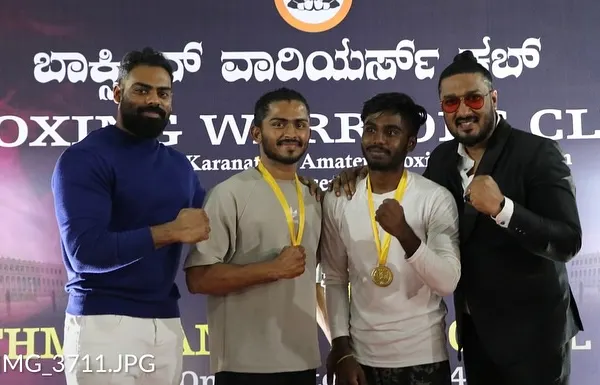 Celebrating with our champions after a successful night at the Boxing Warriors Club event. Seeing them with their medals makes all the hard work worth it.