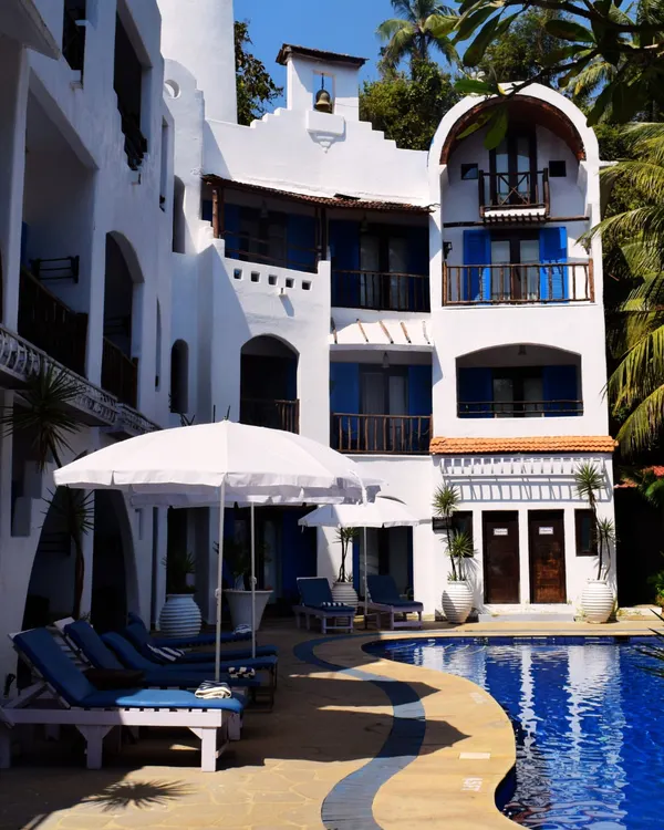 The stunning architecture and poolside of a luxury resort in Goa. I select venues that offer both beauty and comfort for a premium offsite experience.