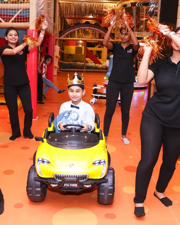 I believe every child deserves to feel like a superstar on their birthday. That's why I offer a grand entrance for the birthday kid, complete with a cool toy car and my cheering staff, making them the hero of the day.