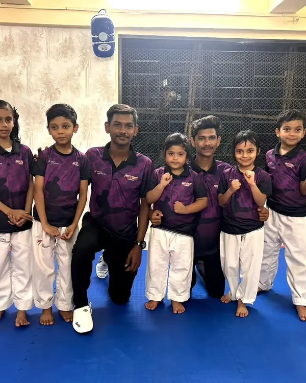 A group of our students with their coaches. We work closely with every child to help them achieve their personal best.