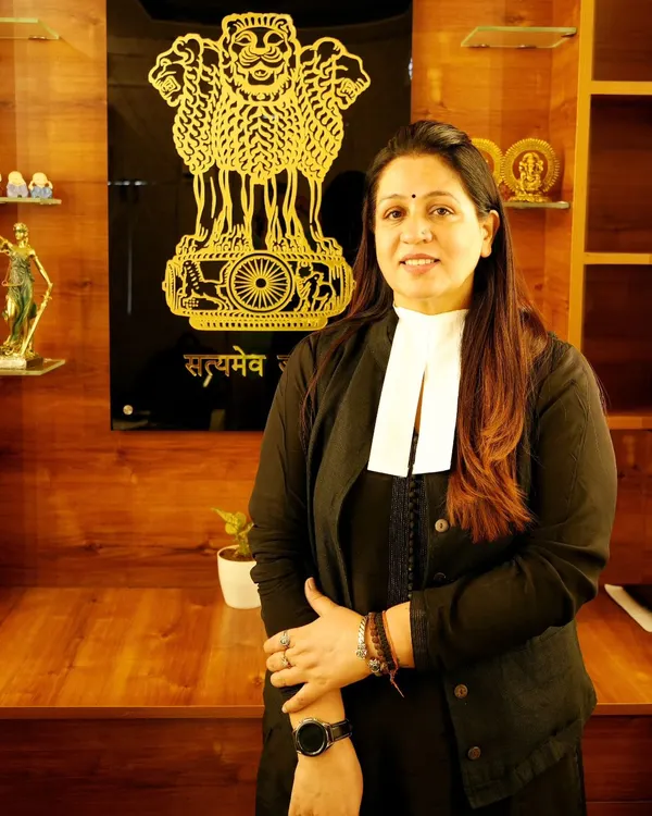 A professional portrait taken in my office. I believe in representing my clients with strength and dignity, and this image reflects the seriousness with which I approach every case.