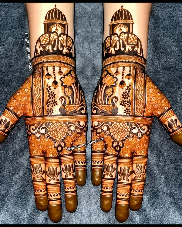 A perfect example of symmetrical bridal mehandi. Both hands feature identical designs with palace domes, elephants, peacocks, and lotus motifs for a balanced and royal look.
