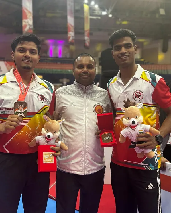 Victory at the 4th KIO National Karate Championship in Hyderabad. Jeetu and Harshit Pandey with me after winning gold in their respective categories.