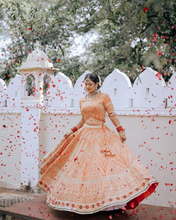 This is what bridal dreams are made of. I love creating these full, cinematic looks for my brides, ensuring every detail from the flow of the lehenga to the flawless makeup is perfect for your big day.