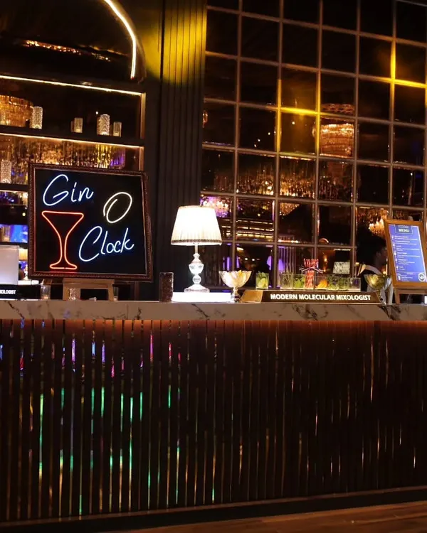 Set the mood with a custom neon sign. This 'Gin O' Clock' sign added a fun, playful touch to a sophisticated, modern bar setup at a private party in Kapasera.